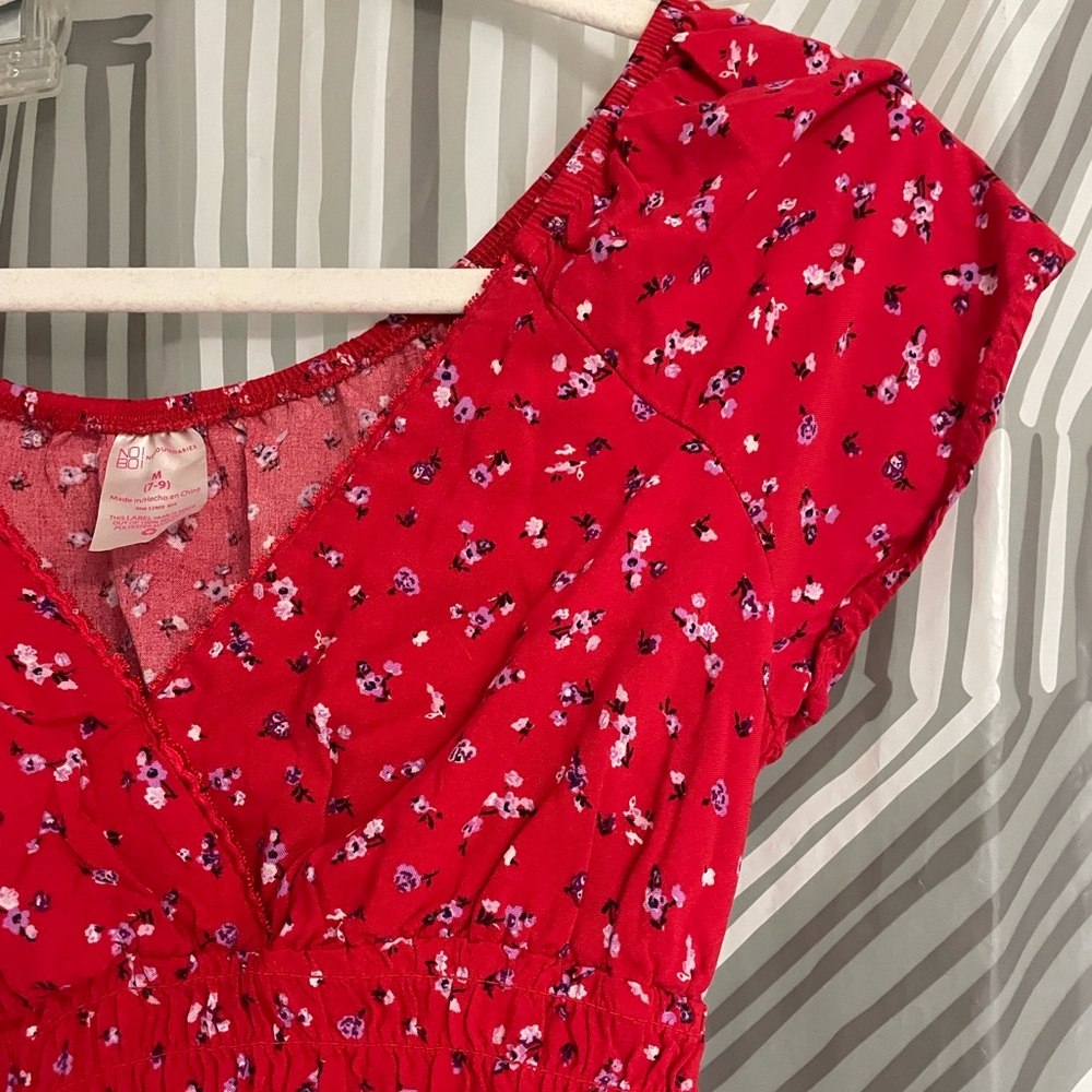 red flowery dress, body con in the middle